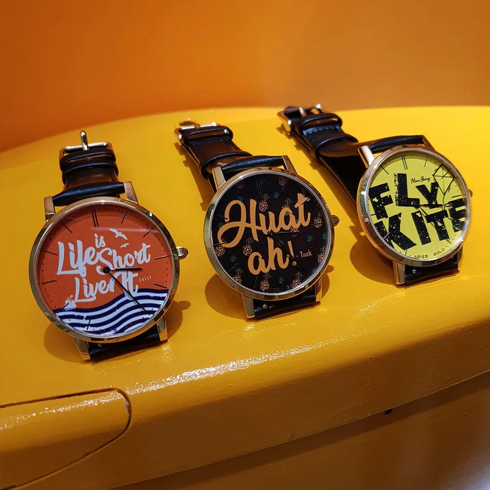 ARIES GOLD CUSTOMISED GOLD STAINLESS STEEL WATCH - LIFE IS SHORT LIVE IT ORANGE UNISEX LEATHER STRAP WATCH